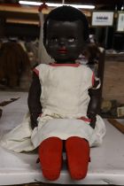 A VINTAGE 'PEDIGREE' BLACK DOLL, WITH SLEEPY EYES, CINDERELLA NO 4 SHOES AND ORIGINAL DRESS