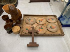 A QUANTITY OF VINTAGE TREEN TO INCLUDE A TRAY WITH CANADIAN COASTERS, EGG CUPSAND WOODEN EGGS, A