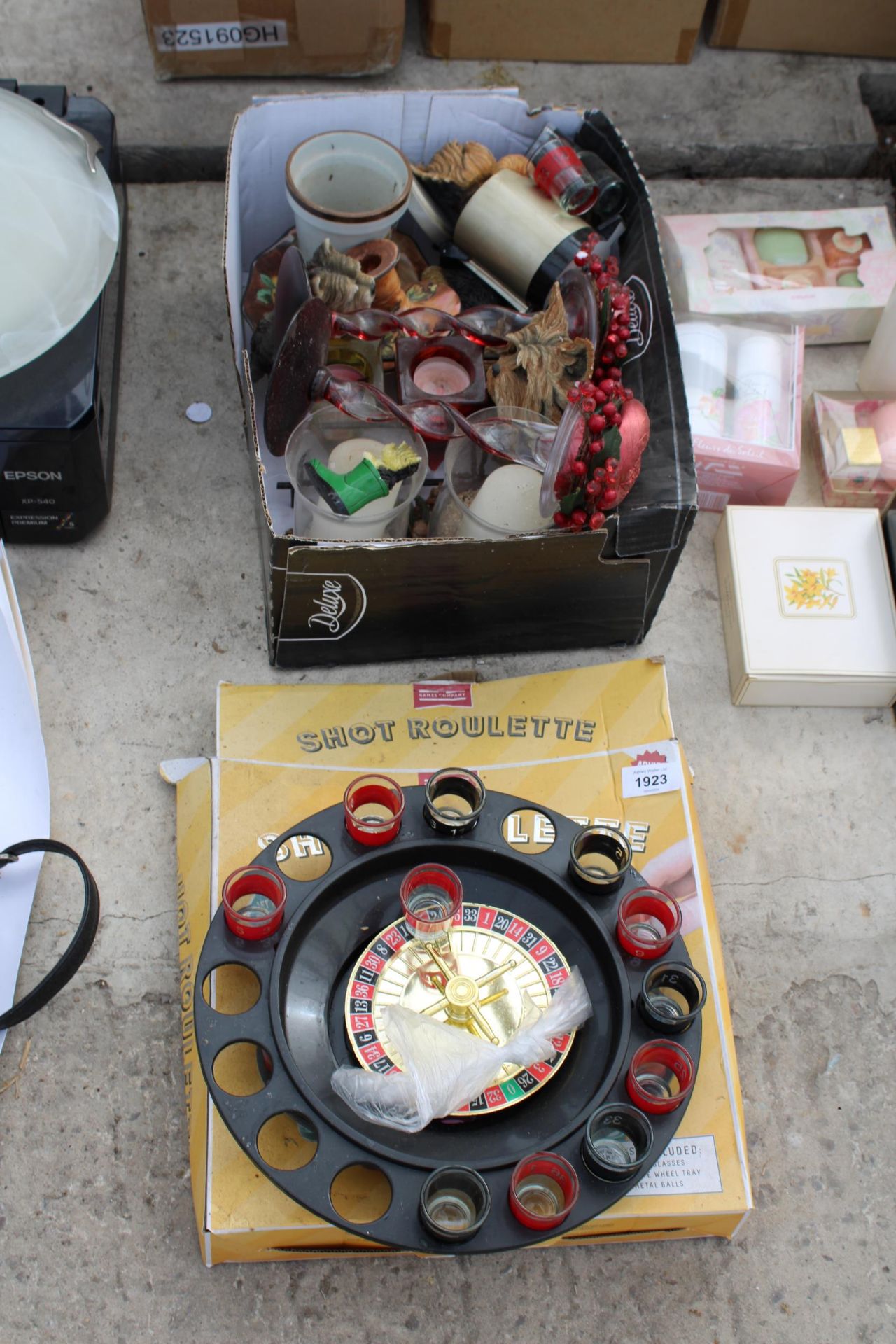 A SHOT ROULETTE GAME AND AN ASSORTMENT OF GLASS AND CERAMIC CANDLE HOLDERS ETC