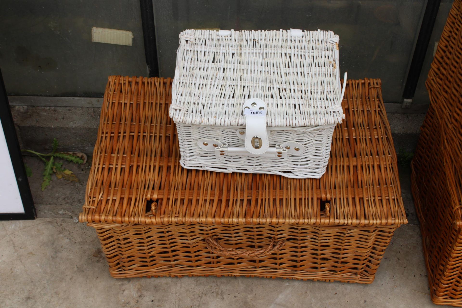 A WICKER PICNIC HAMPER AND A FURTHER SMALL WICKER BASKET