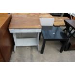 A MID TWENTIETH CENTURY CHILDS DESK AND BLACK LAMP TABLE