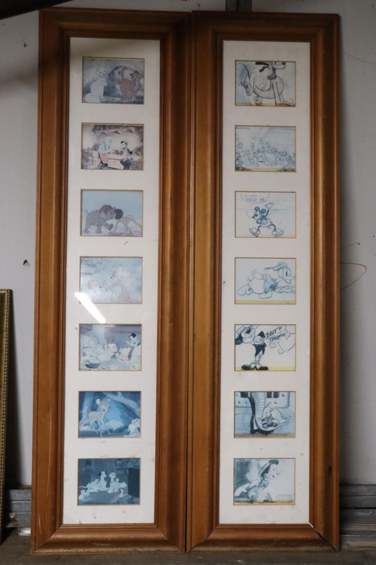 A PAIR OF DISNEY CARTOON SLIDES IN PINE FRAMES