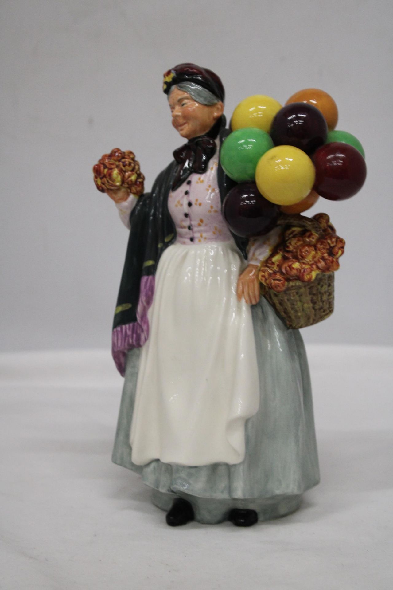 A ROYAL DOULTON FIGURE " BIDDY PENNY FARTHING" HN 1843 - Image 2 of 6