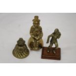 THREE BRASS ITEMS TO INCLUDE A HEAVY PAPERWEIGHT, CLOWN AND RUGBY PLAYER