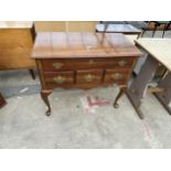 A 19TH CENTURY STYLE MAHOGANY LOWBOY AND CABRIOLE LEGS, ENCLOSING FOUR DRAWERS, 36" WIDE