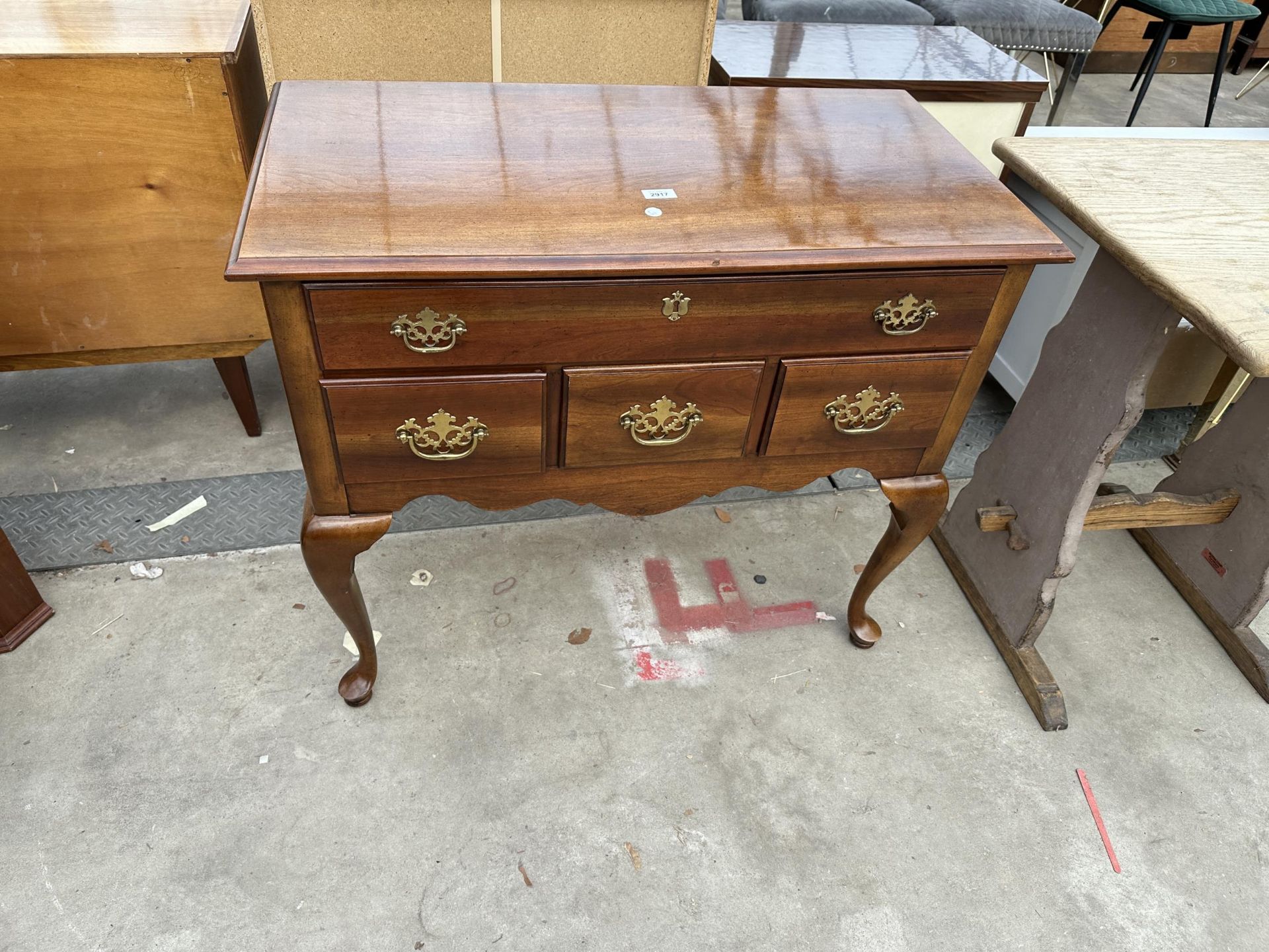 A 19TH CENTURY STYLE MAHOGANY LOWBOY AND CABRIOLE LEGS, ENCLOSING FOUR DRAWERS, 36" WIDE