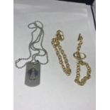 TWO GOLD PLATED T BAR BRACELETS AND A WHITE METAL DOLPHIN PENDANT NECKLACE