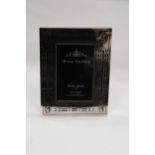 A RENNIE MACINTOSH STYLE SILVER PLATED PHOTO FRAME