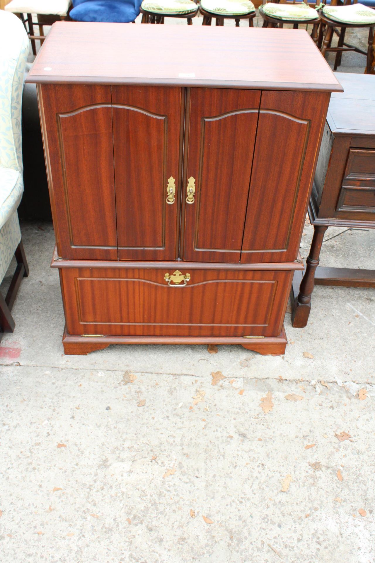 A MODERN TWO DOOR T.V. CABINET, 30" WIDE