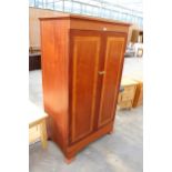 A MODERN MAHOGANY AND CROSSBANDED TWO DOOR WARDROBE, 37.5" WIDE