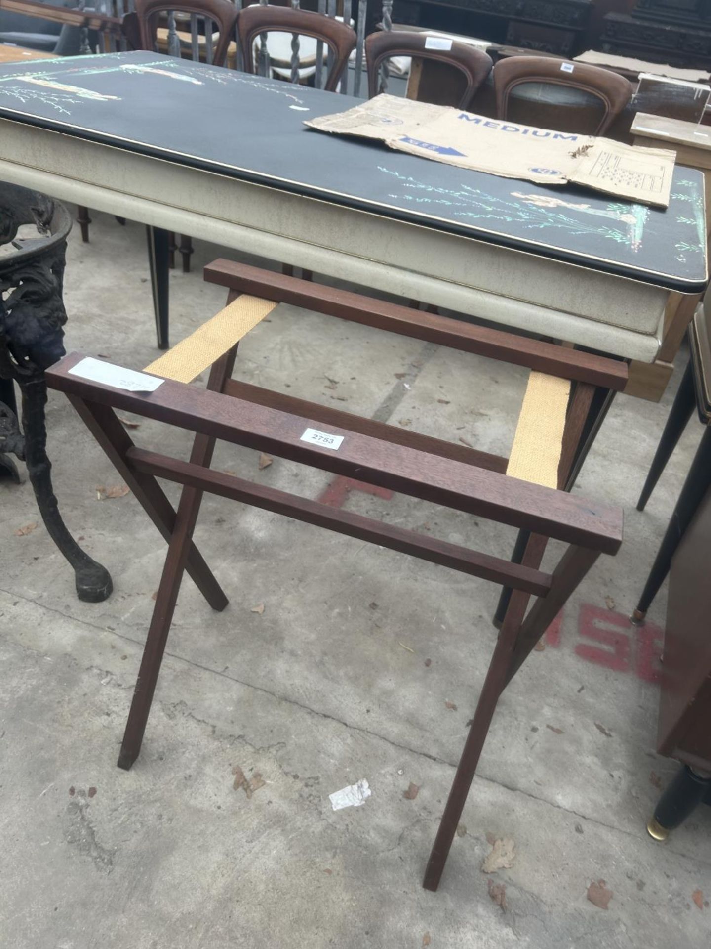 A MODERN MAHOGANY FOLDING BUTLERS TRAY STAND