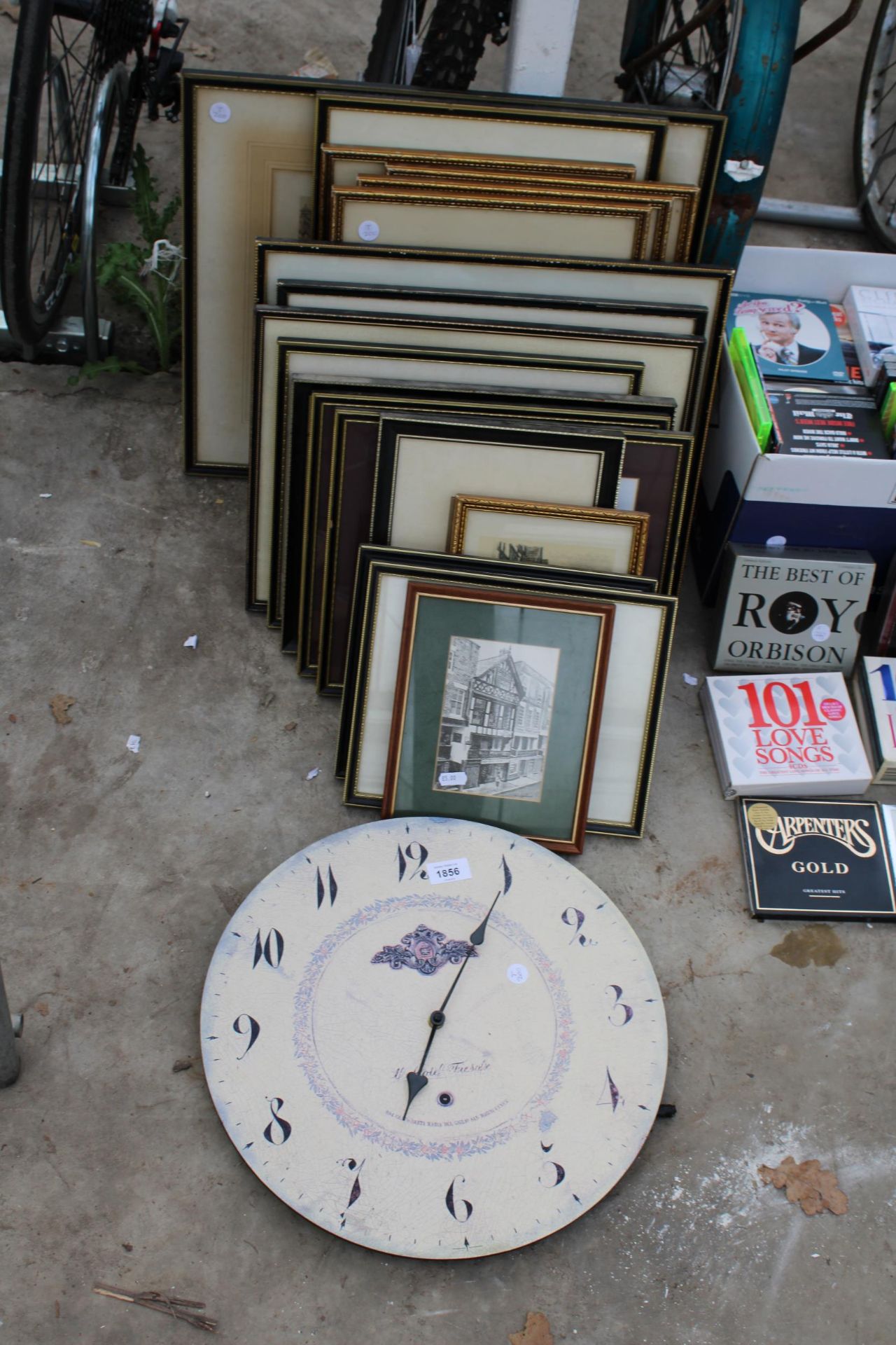 AN ASSORTMENT OF FRAMED PRINTS AND A CLOCK