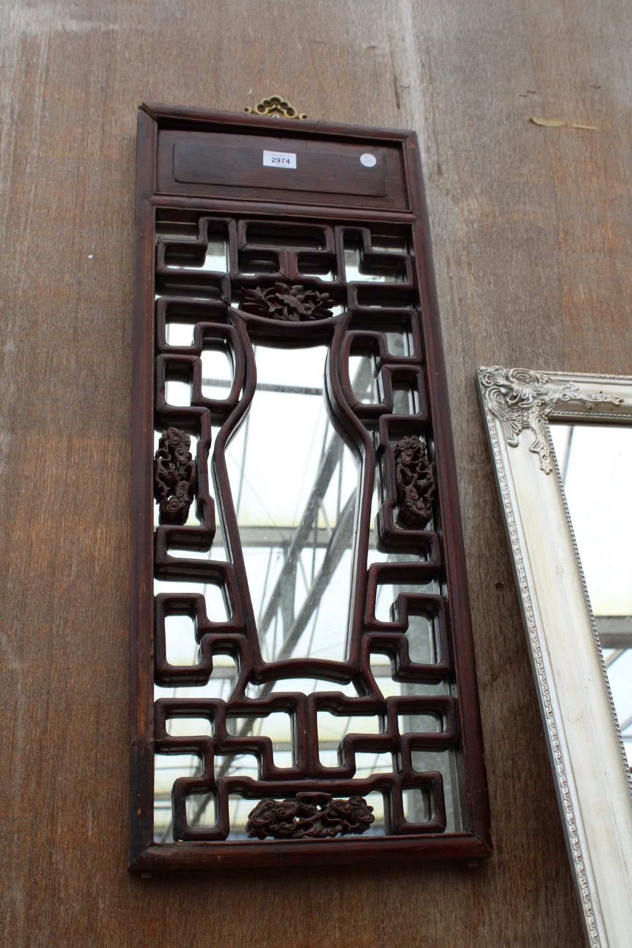 AN ORIENTAL HARDWOOD CARVED AND MIRRORED PANEL 33" X 13" - Image 2 of 2