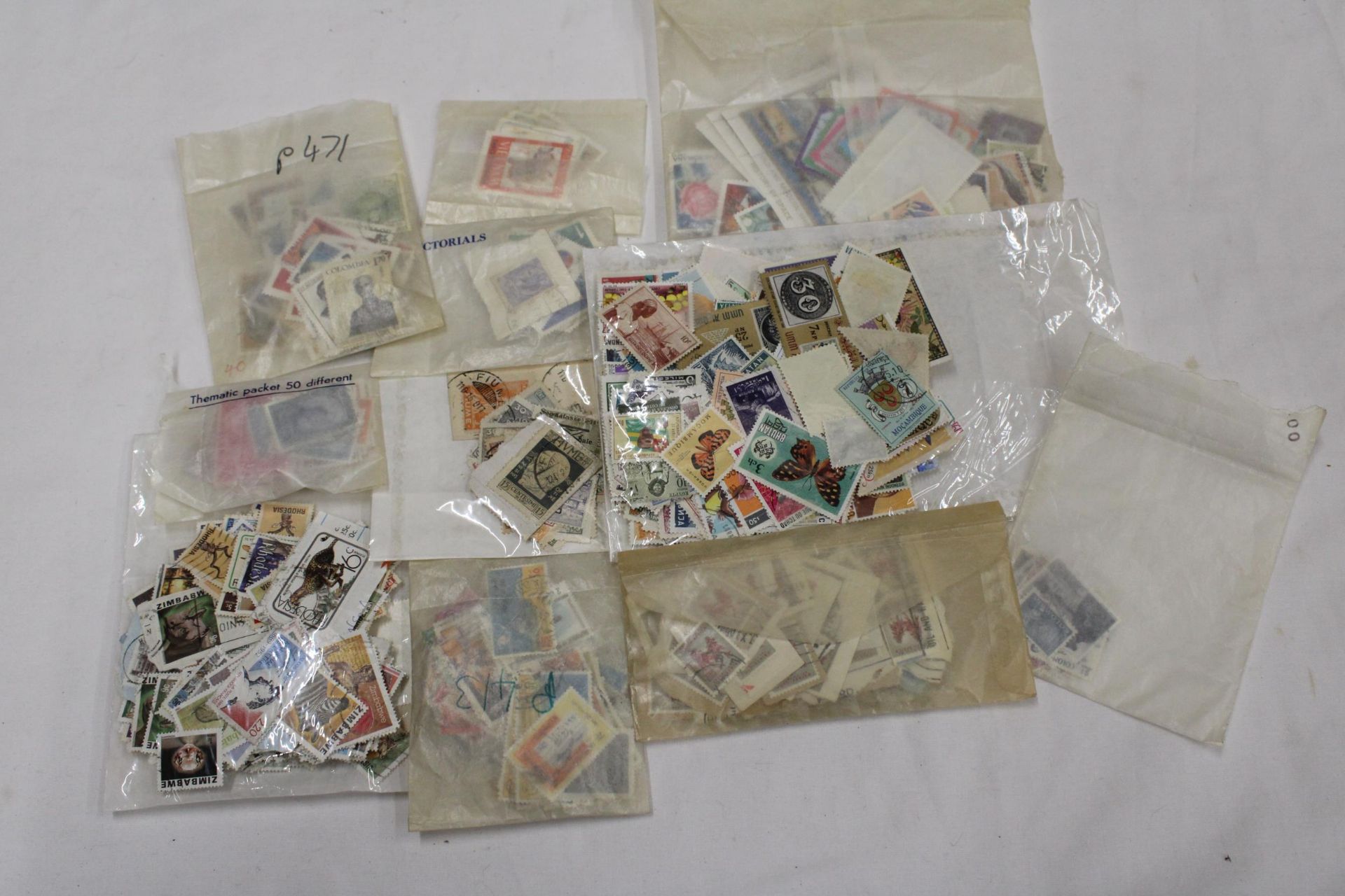 A COLLECTION OF STAMPS IN PACKETS