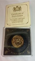 A 2012 DIAMOND JUBILEE GOLD SOVEREIGN WITH CERTIFICATE OF AUTHENTICITY