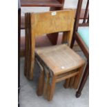 A SET OF THREE MID 20TH CENTURY CHILDS STACKING CHAIRS
