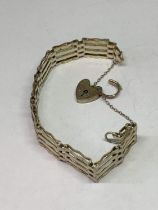 A FOUR BAR SILVER GATE BRACELET