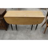 A RETRO TEAK DROP-LEAF DINING TABLE, 52" X 42" OPENED ON BLACK TAPERING LEGS WITH CHROME