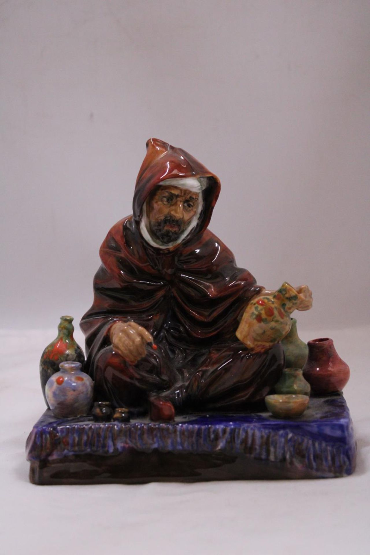 A ROYAL DOULTON "THE POTTER" FIGURINE HN1493W