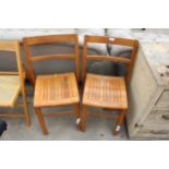 A PAIR OF KINGFISHER (WEST BROMWICH) VINTAGE STACKING CHAIRS