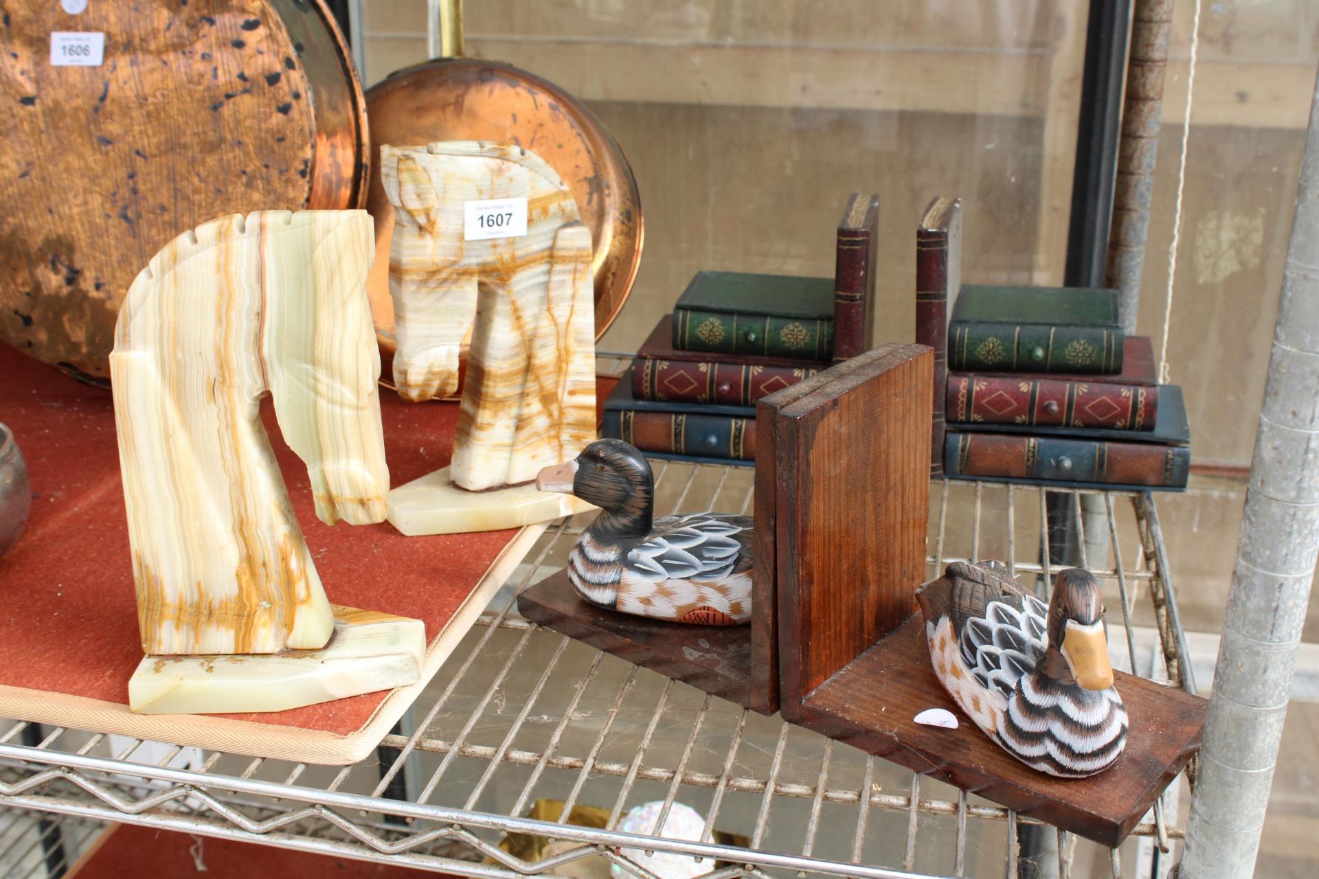 THREE PAIRS OF BOOK ENDS TO INCLUDE A PAIR OF MARBLE HORSES HEADS AND A PAIR OF DUCKS ETC