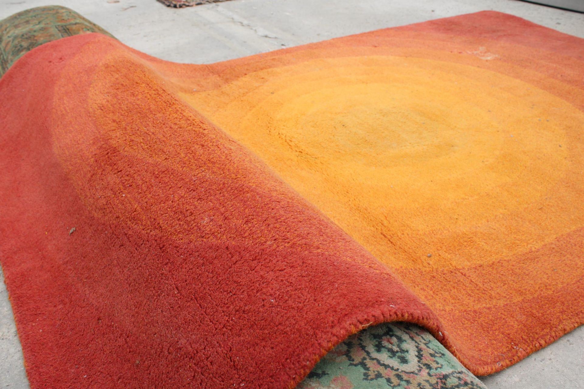 A MODERN ORANGE RUG - Image 3 of 3