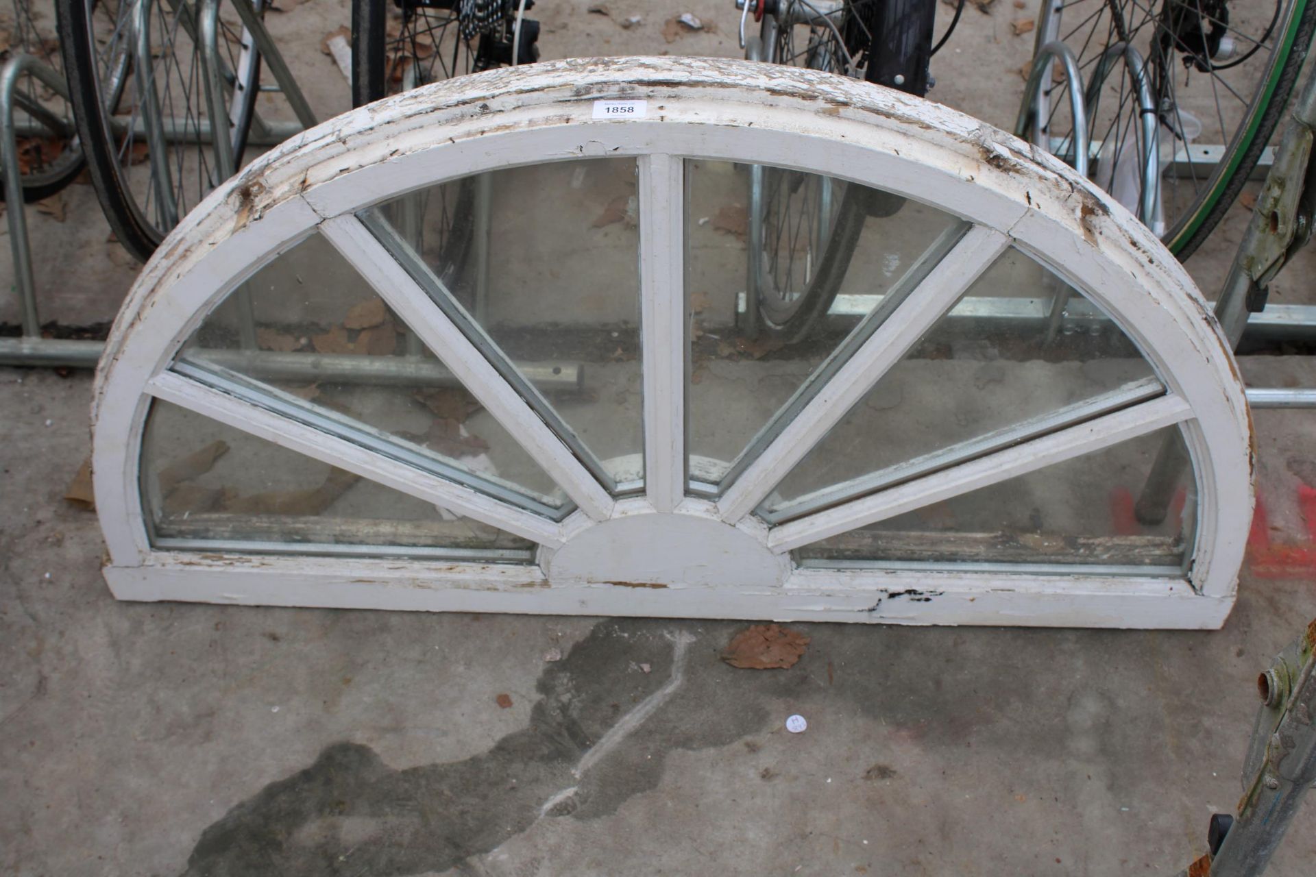 A VINTAGE WOODEN FRAMED FAN LIGHT WINDOW