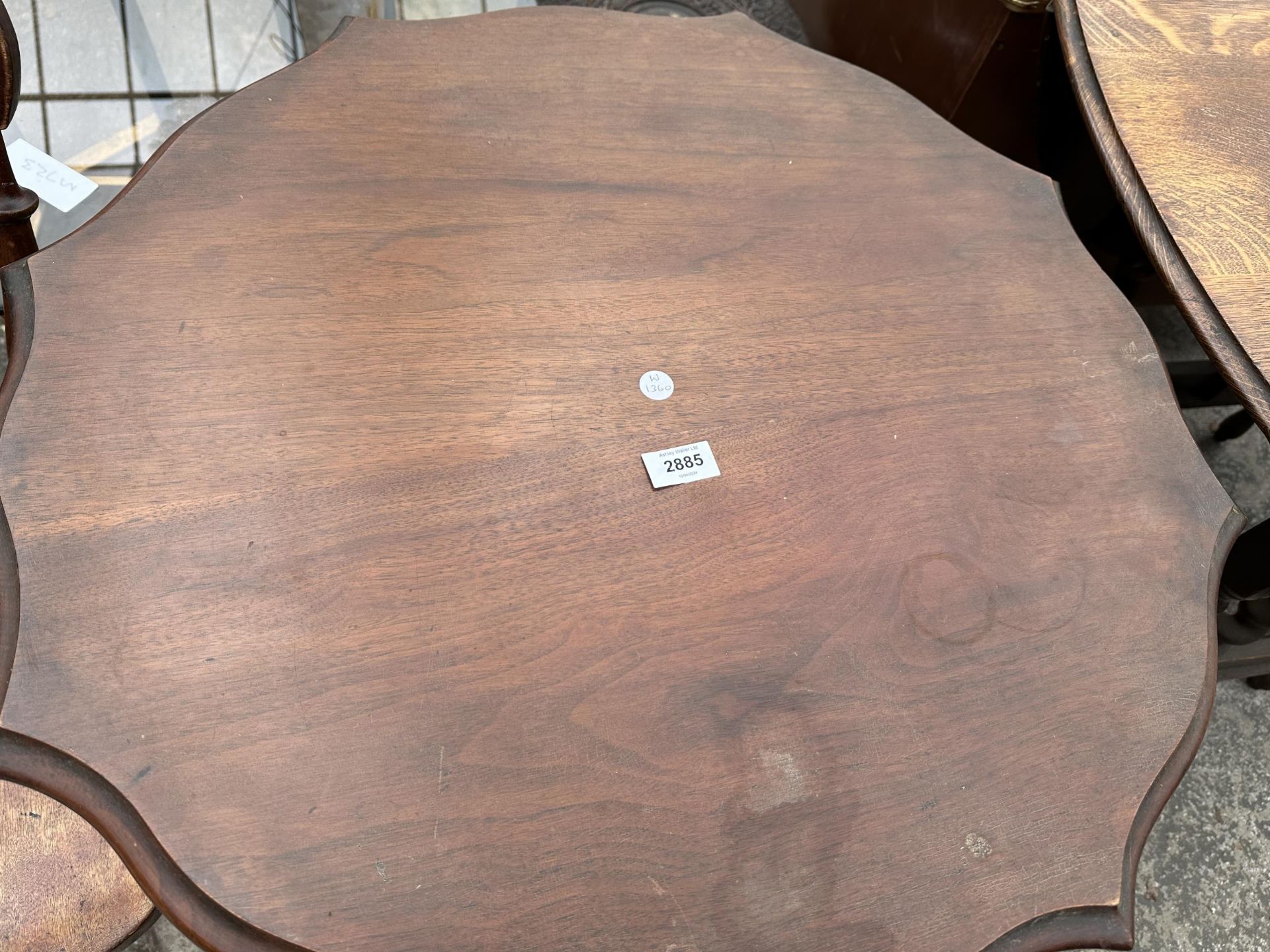 A LATE VICTORIAN MAHOGANY TWO TIER CENTRE TABLE 27" ACROSS - Image 2 of 3