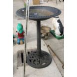 A PLASTIC BIRDBATH WITH PEDESTAL BASE