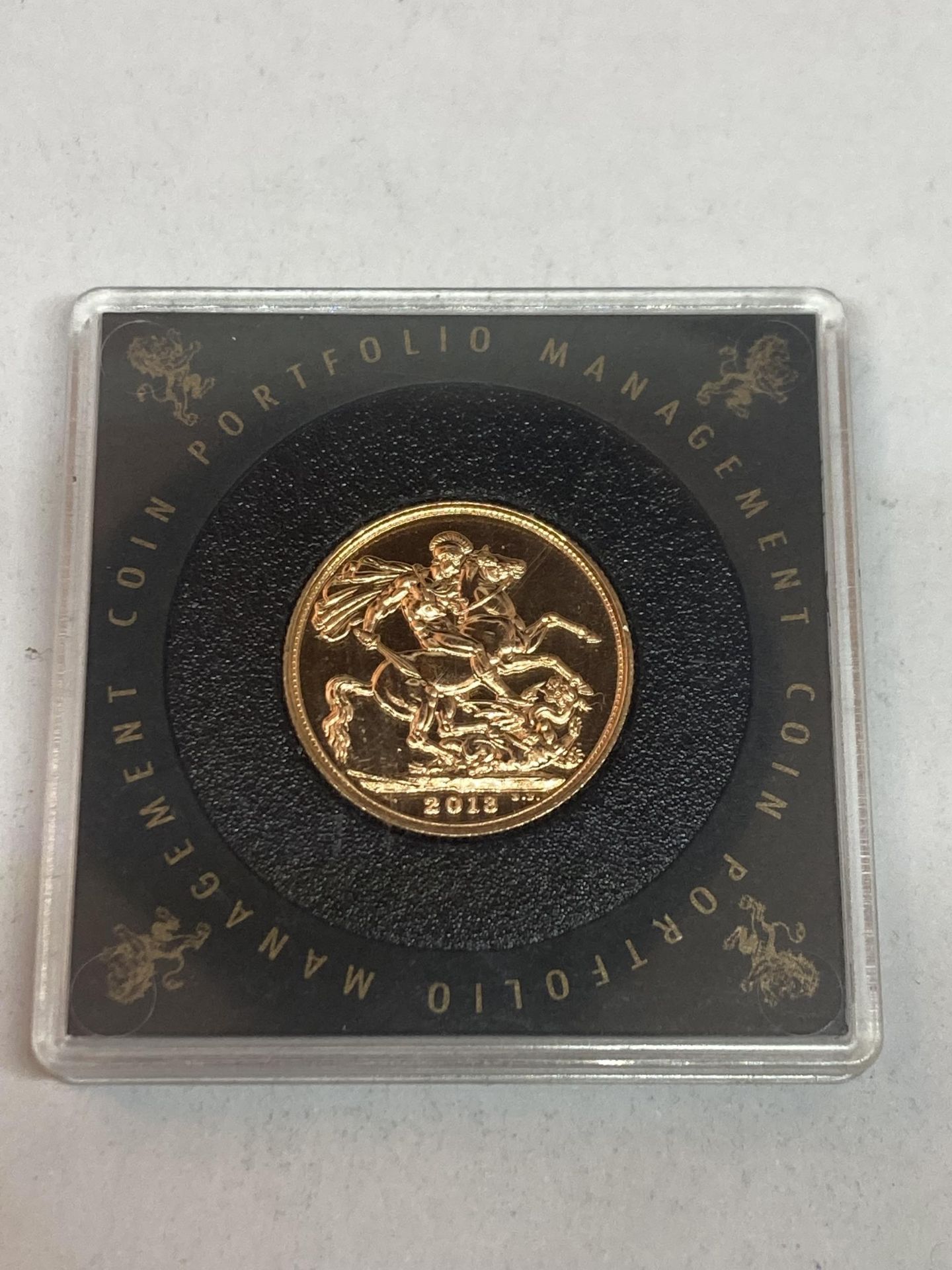 A CASED UNCIRCULATED GOLD SOVEREIGN DATED 2018