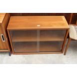 A RETRO TEAK BOOKCASE WITH TWO SLIDING DOORS 35.5" WIDE
