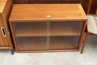 A RETRO TEAK BOOKCASE WITH TWO SLIDING DOORS 35.5" WIDE