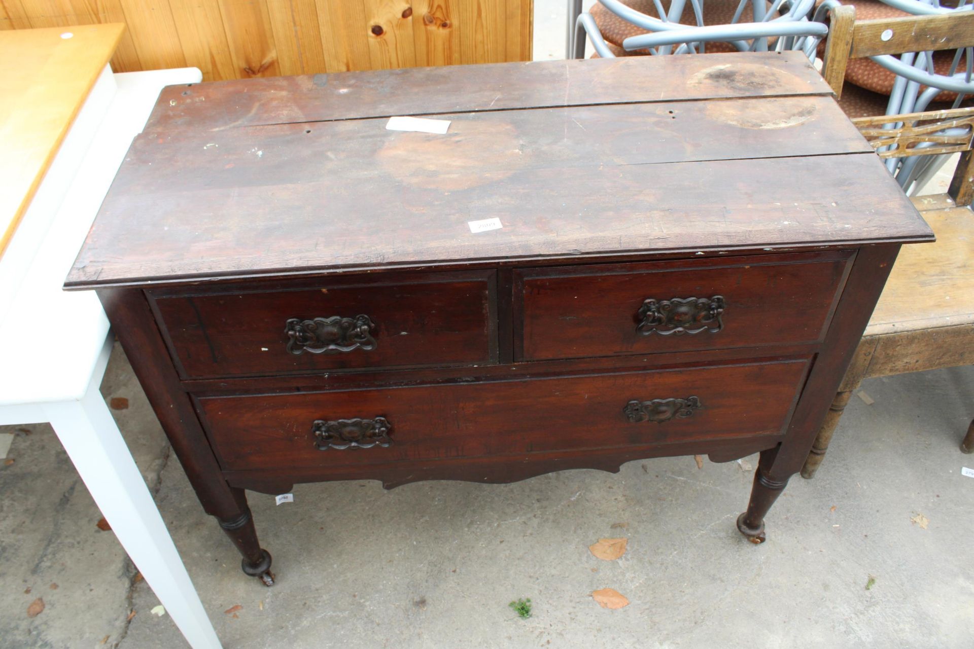 A LATE VICTORIAN CHEST OF TWO SHORT AND ONE LONG DRAWER, 42" WIDE