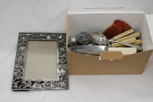 A MIXED LOT TO INCLUDE FLATWARE, PHOTO FRAMES,ETC