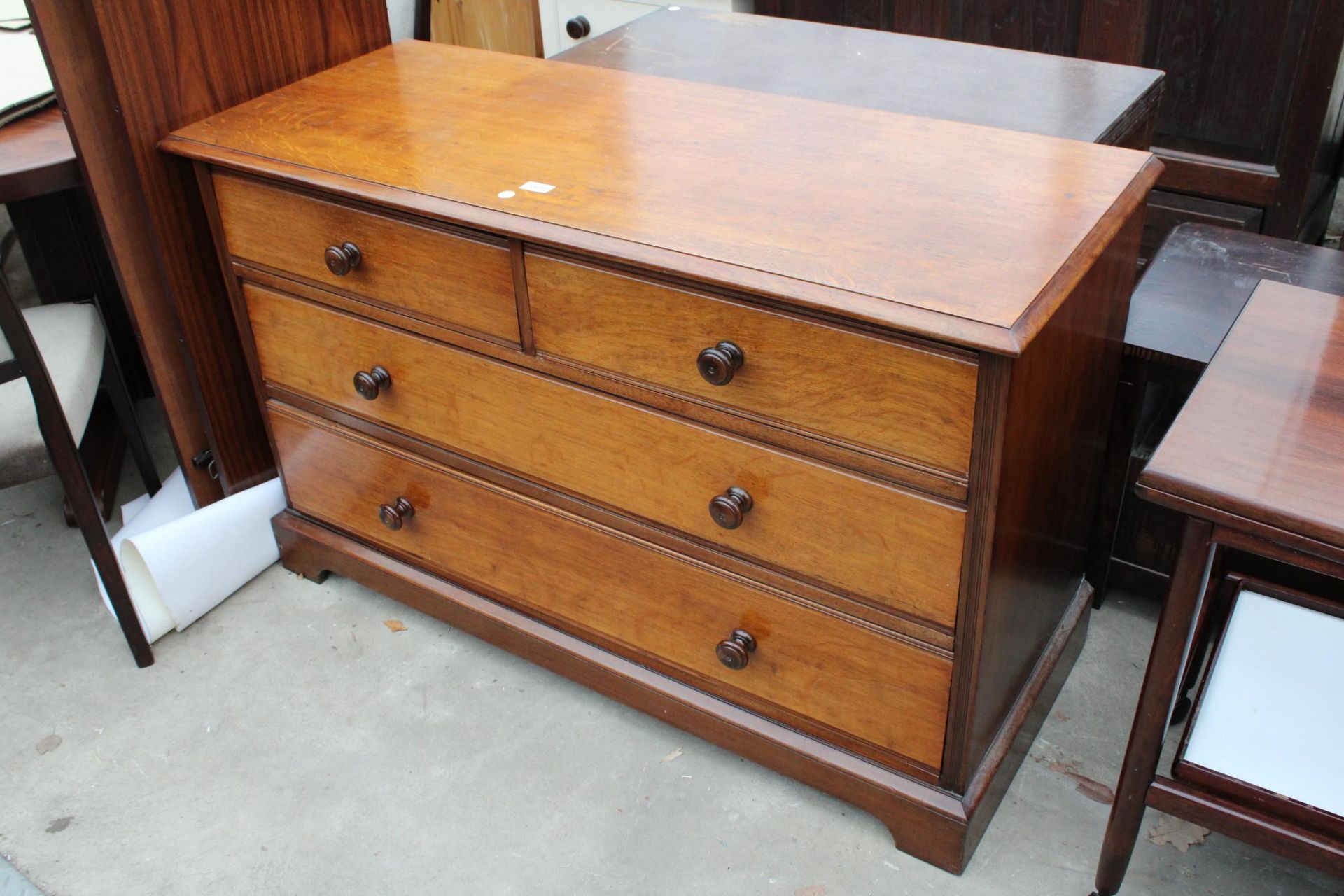 A VICTORIAN OAK CHEST OF TWO SHORT AND TWO LONG DRAWERS, 48" WIDE