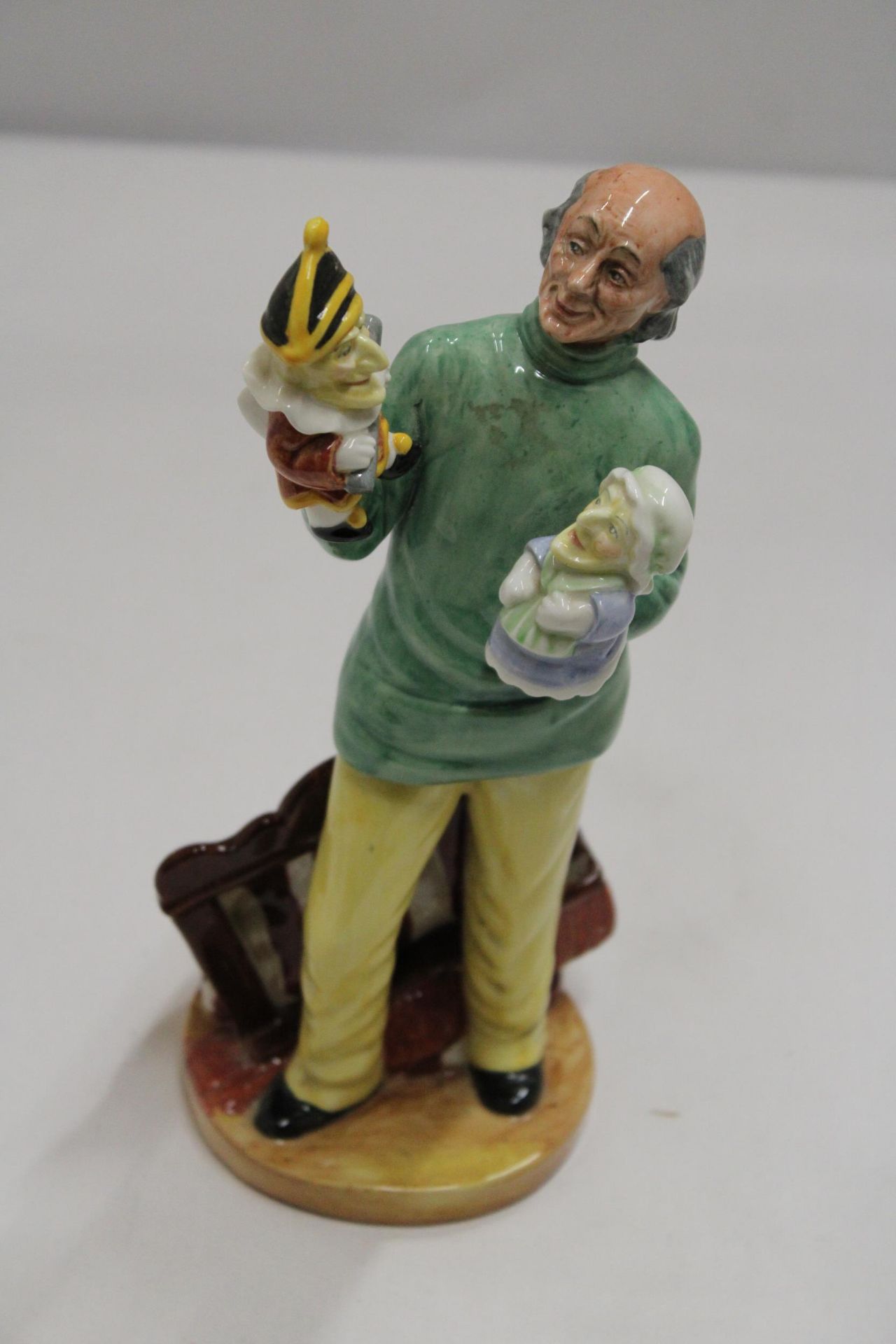 A ROYAL DOULTON FIGURE PUNCH AND JUDY MAN HN 2765