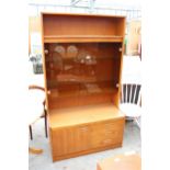 A RETRO TEAK UNIT WITH SMOKED GLASS DOORS, CUPBOARD AND DRAWERS TO BASE. 39.5" WIDE