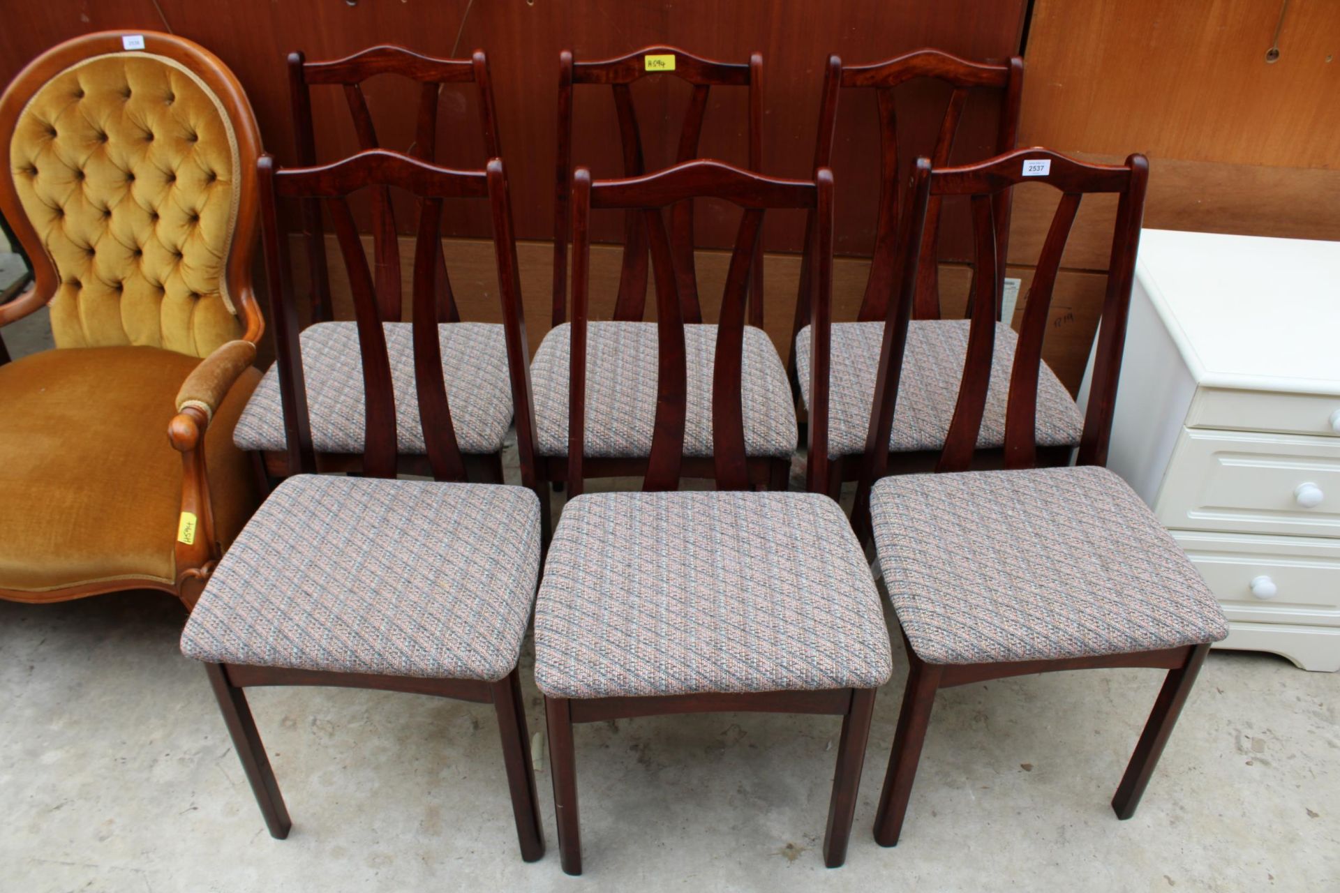 A SET OF SIX BEECH FRAMED DINING CHAIRS