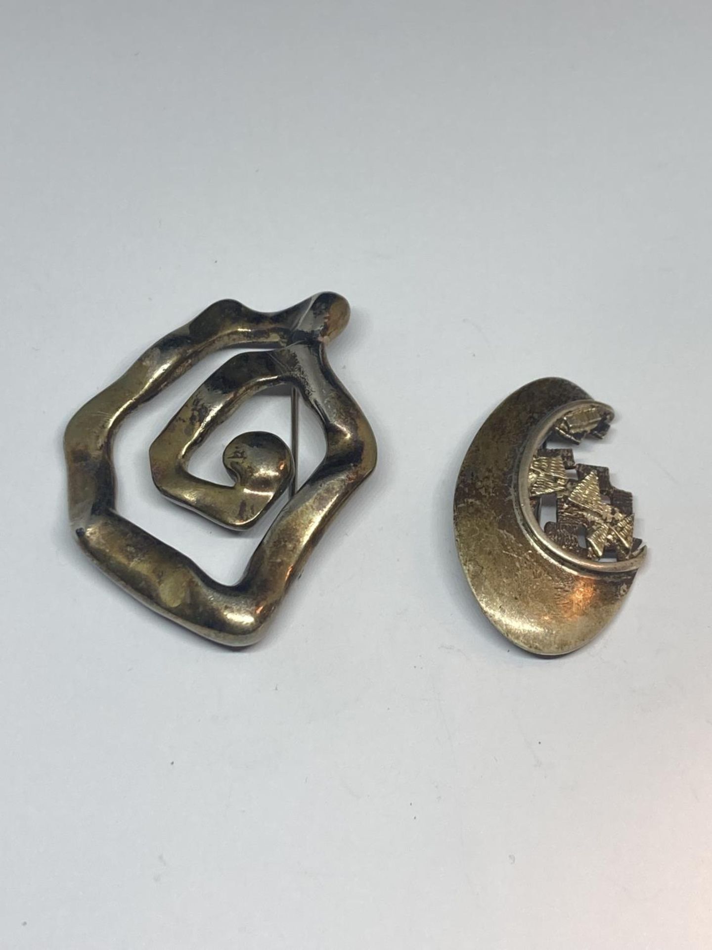TWO SILVER BROOCHES