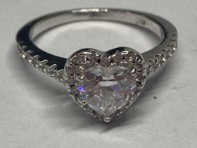 A MARKED 9K RING WITH 1 CARAT OF MOISSANITE IN A HEART DESIGN SIZE L/M GROSS WEIGHT 2.98 GRAMS