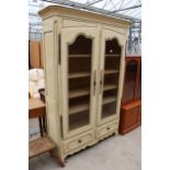 A MOEDERN WHITE PAINTED CONTINENTAL STYLE TWO DOOR GLAZED CABINET WITH TWO DRAWERS TO BASE 52" WIDE