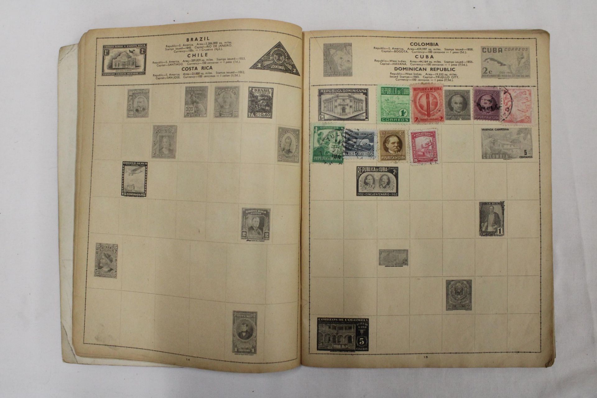 TWO OLD ALBUMS CONTAINING STAMPS FROM AROUND THE WORLD - Image 2 of 6