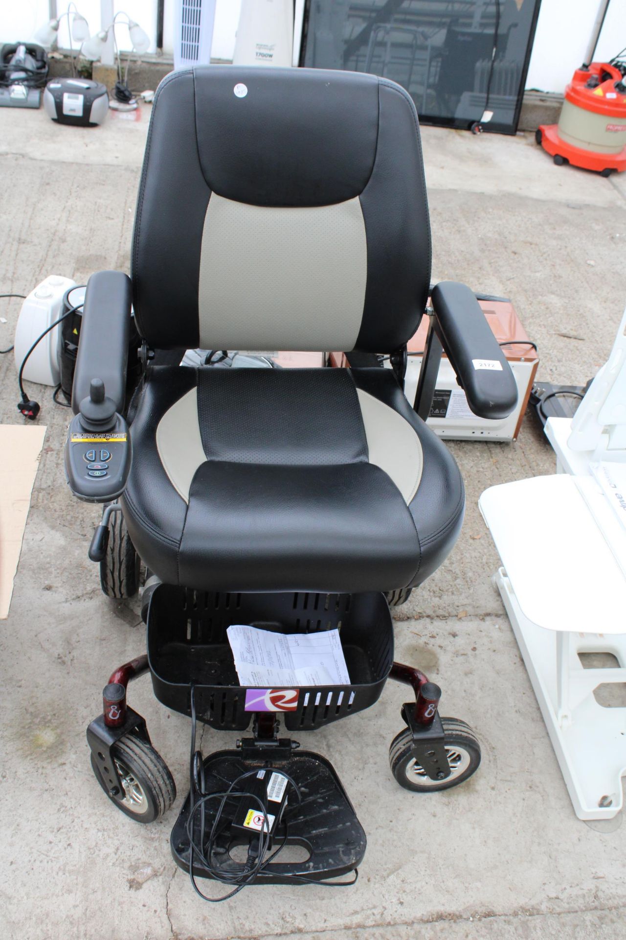 A ROMA POWER CHAIR WITH CHARGER - VERY LITTLE USE AND IN VERY GOOD CONDITION