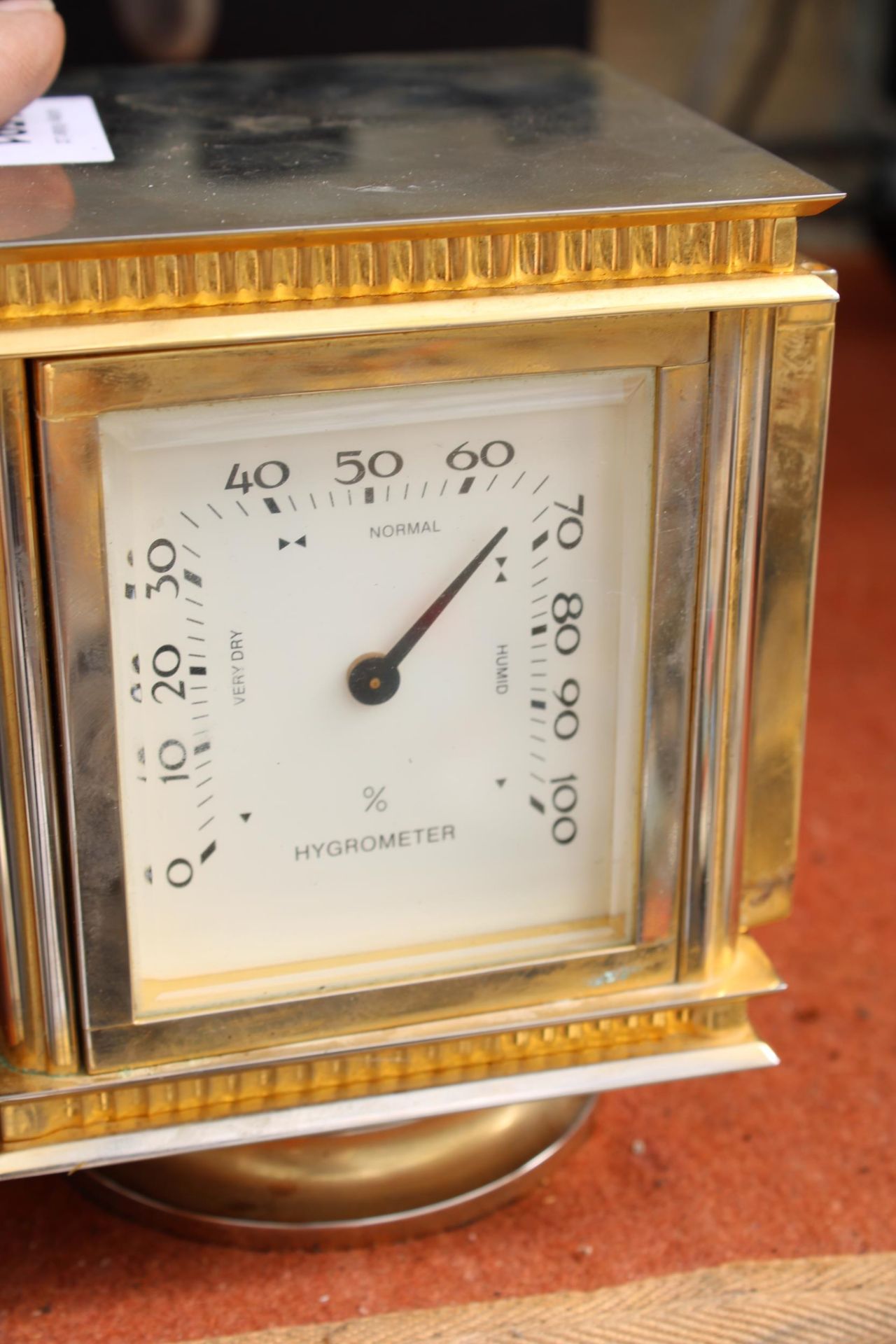 A BRASS JENS OLSEN REVOLVING DESK CLOCK WITH FOUR FACES, TWO BEING CLOCKS, ONE THERMOMETER AND ONE - Image 4 of 6