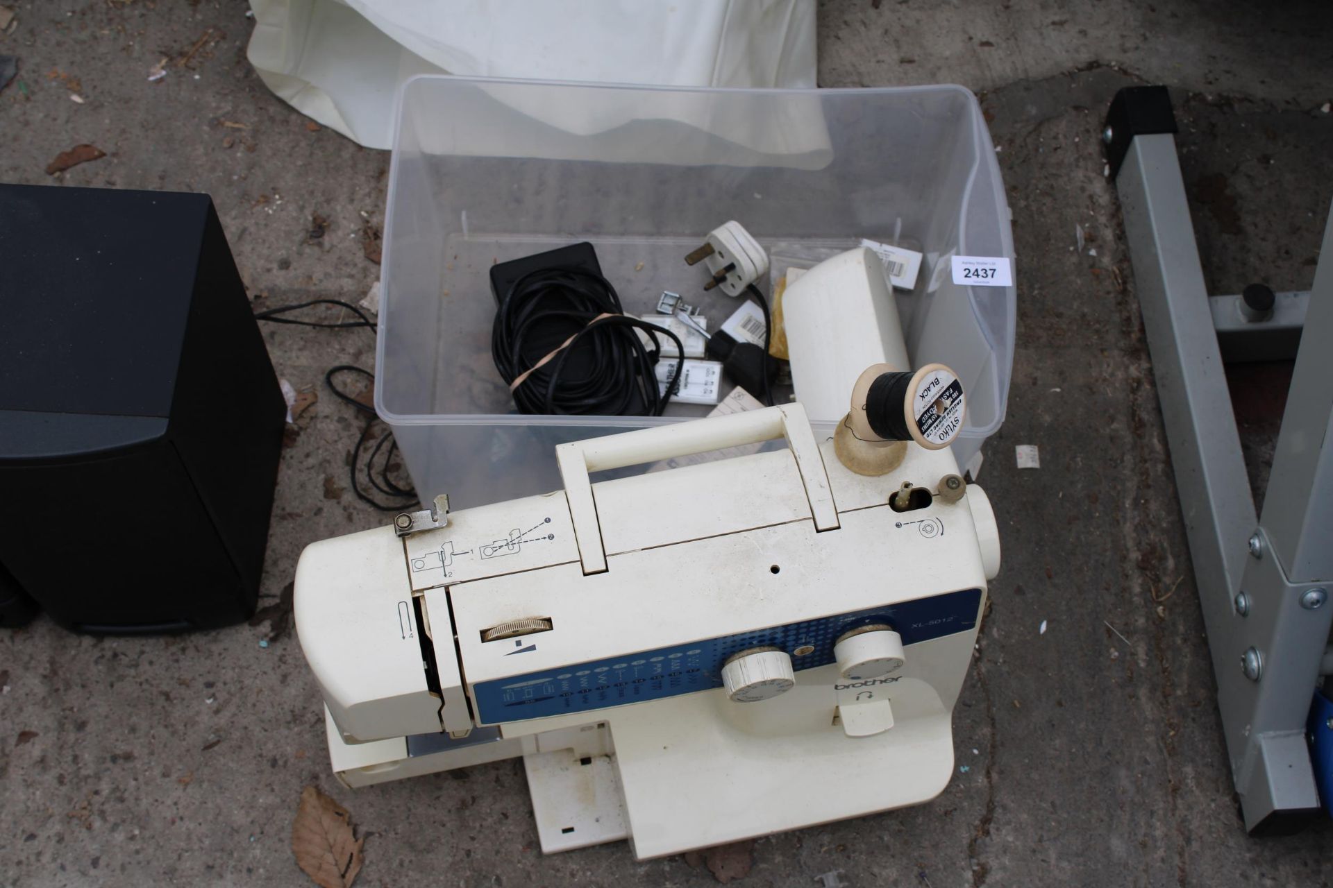 A BROTHER ELECTRIC SEWING MACHINE WITH FOOT PEDAL