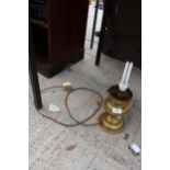 A VINTAGE BRASS OIL LAMP CONVERTED TO ELECTRIC