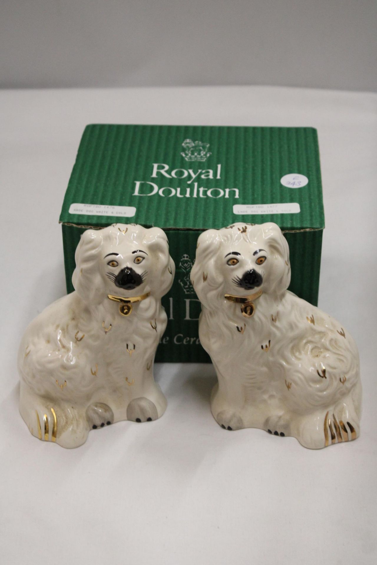 A PAIR OF MEDIUM SIZED SPANIEL DOGS IN ORIGINAL BOX