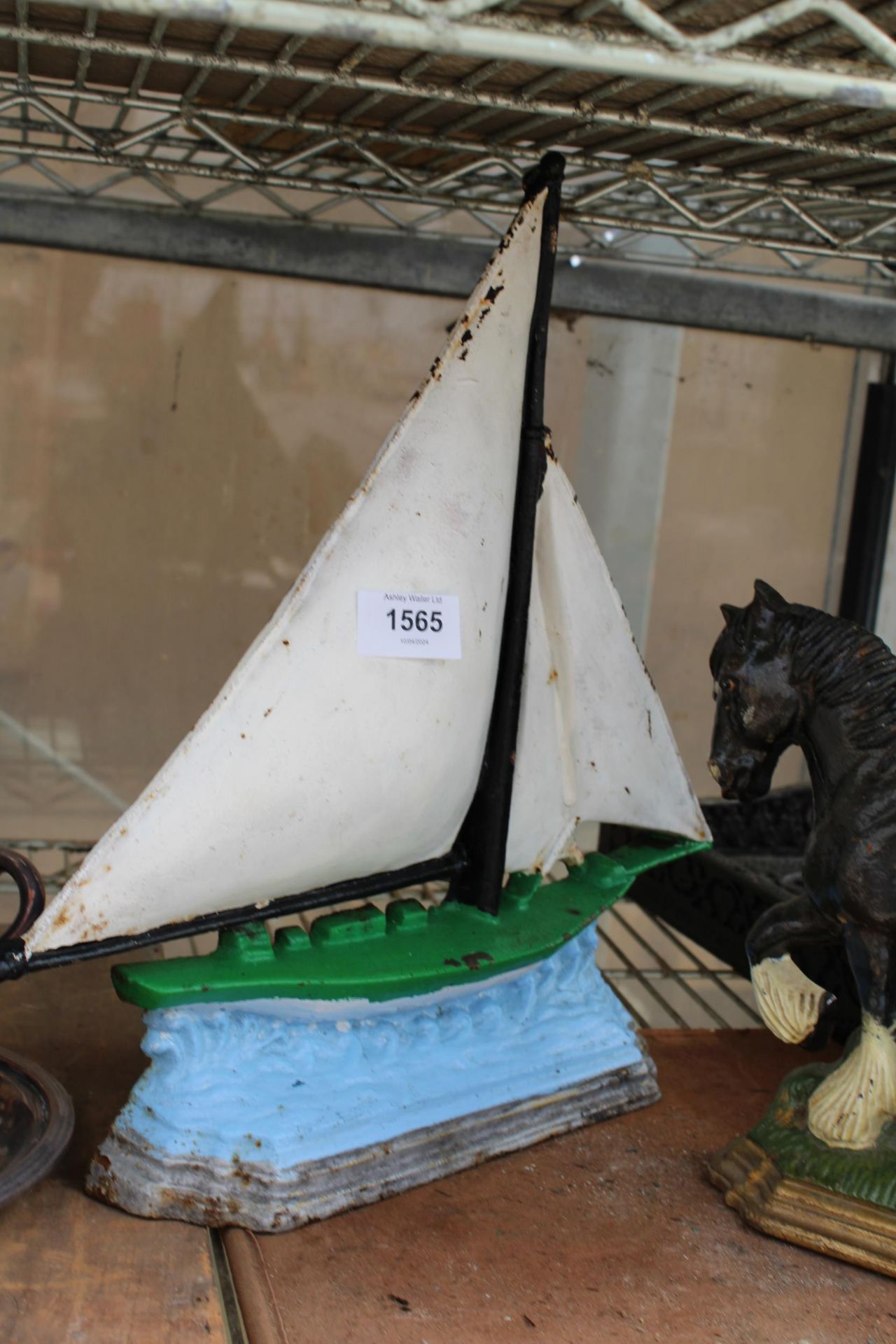 TWO CAST IRON DOOR STOPS, ONE IN THE FORM OF A SHIRE HORSE AND THE OTHER A BOAT - Image 2 of 3