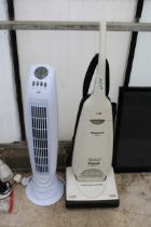 A PANASONIC VACUUM CLEANER AND A TOWER FAN