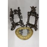 TWO HEAVY VINTAGE BRASS PHOTO FRAMES WITH ORNATE DECORATION AND REGISTRATION NUMBER TO THE BACK,